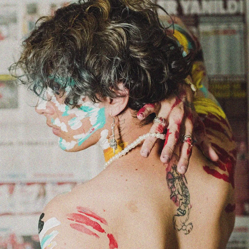 Tatuaje de fénix a color en la espalda, cliente Marielba Torres